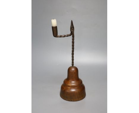 A Georgian wrought iron rush light/candlestick, height 37cm