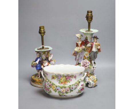 A Potschappel porcelain figural lamp, another similar lamp and a Dresden bowl with swags of flowers, tallest 28cm