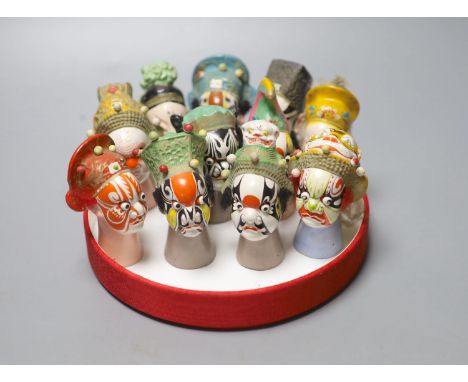Eleven Chinese painted clay puppet heads, Fujian Province, 20th century