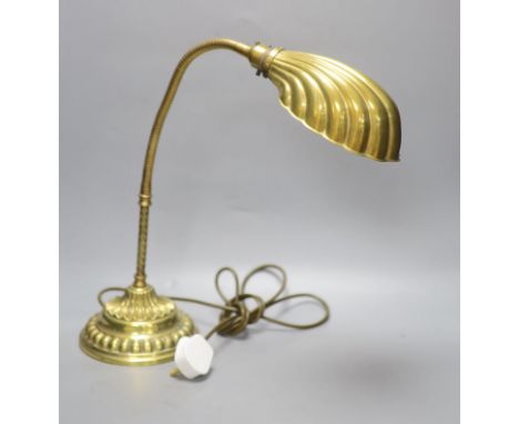 A brass anglepoise 'shell' desk lamp