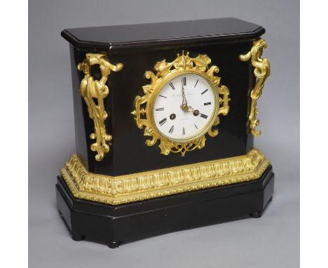 A late 19th century French ebonised and ormolu mounted mantel clock, height 33cm