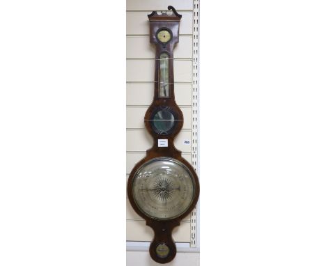 Ciceri and Co., London. A Regency inlaid mahogany wheel barometer and thermometer, length 119cm