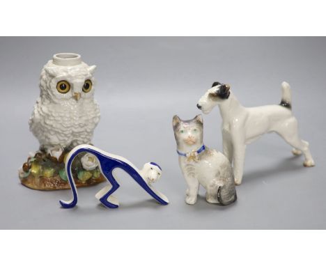 A Victorian porcelain 'owl' oil lamp base, lacking mount, an Austrian porcelain terrier and two other ceramic animals, talles
