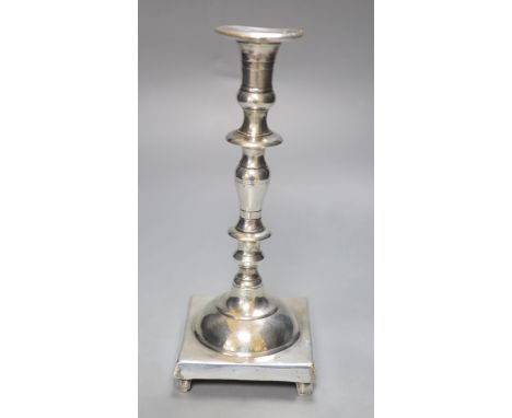 An 18th century Continental candlestick, possibly Paktong, height 24.5cm