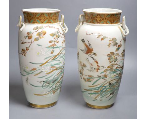 A pair of rare Japanese ceramic vases, signed Tokyo Houen, Meiji period, height 33cm