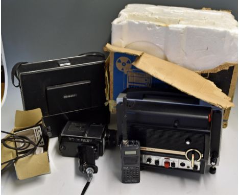 Chinon Sound 8000 Film Projector comes with original box (poor), plus a selection of reels with film screen and frame, also i