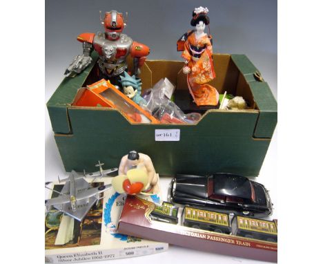 Mixed Selection of Toys to include modern robot, jigsaw puzzle, battery operated car, plastic dolls and figure, tins, beanie 