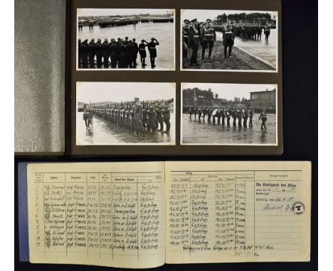 Documents and flugbuch (flight book) belonging to Karl Franz, Luftwaffe Unteroffizier, who flew with Junkers and Heinkel bomb