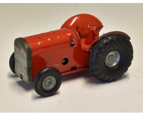 Triang Minic Clockwork 'Tractor' Toy made in England in red, without original box, in good condition