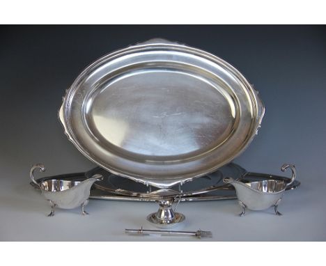 A collection of silver plated wares, to include; three Mappin and Webb, Mappin Plate serving dishes, a pair of sauce boats ra