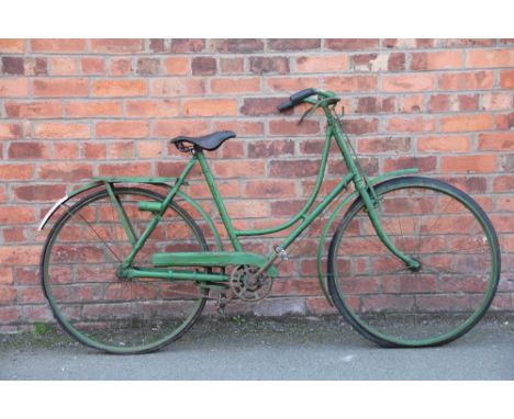 A vintage Hercules Lady's loop frame bicycle,  with later green painted finish