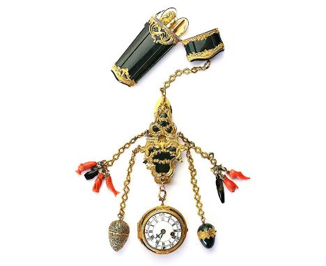 An 18th century French gilt metal mounted bloodstone chatelaine, the cartouche shaped hinged belt clip decorated with a shell