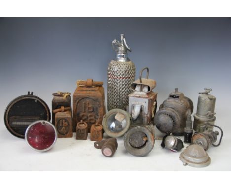 A selection of vintage bicycle and other lamps, to include a small P&H 'Starlight' and a larger black painted iron light and 