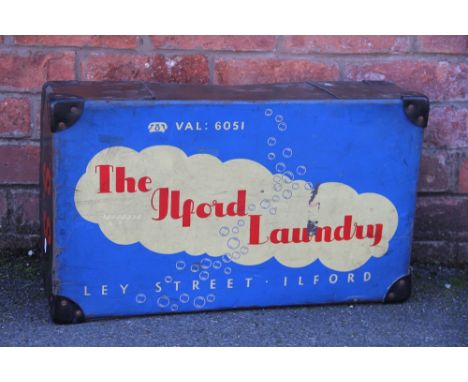 A vintage 'The Ilford Laundry' laundry box and cover, 61cm long