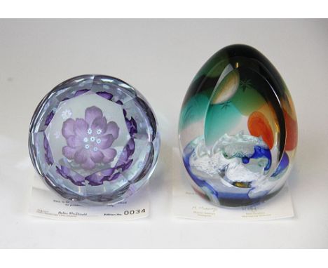 A Caithness Glass paperweight; Galway Bay designed by Martin Murray numbered 4/100 and another 'Divine' designed by Helen Mac