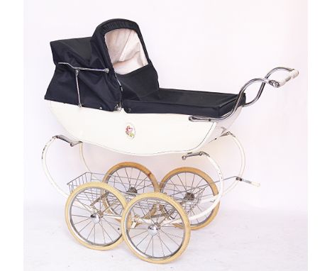 A Silver Cross Child's pram, with foliate ceramic panels to the sides