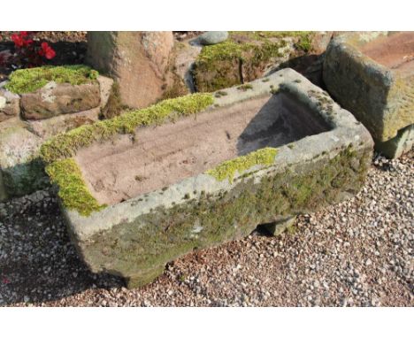 A late 19th century sandstone trough, 25cm H x 90cm W