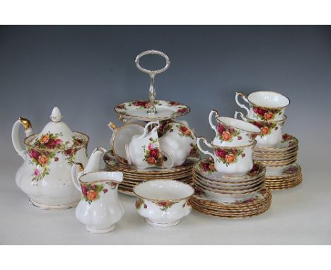 A Royal Albert Old Country Roses pattern part tea service, to include; teapot and cover, cake stand, cups, saucers, plates, m