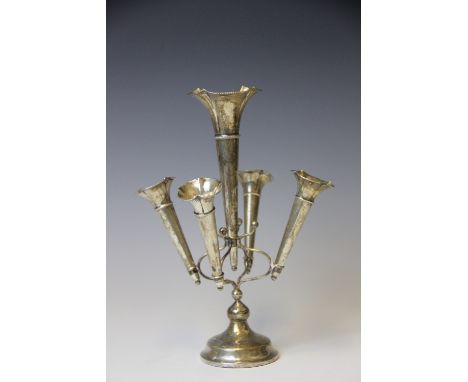 A silver epergne, 'R & P', Birmingham 1923, with central trumpet and four further smaller examples surrounding, loaded, 27cm 