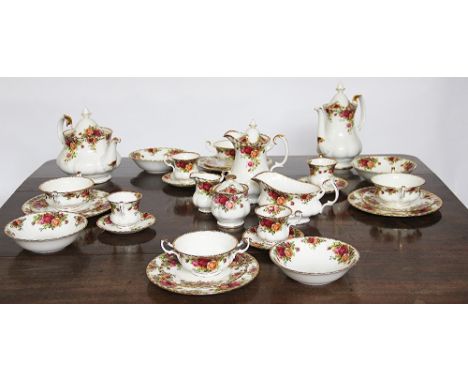 An extensive Royal Albert Old Country Roses part dinner, tea and coffee service, to include coffee pot and cove, tea pot and 