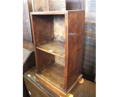 A small oak open book shelf