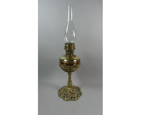 A Late 19th Century Brass Oil Lamp with Pierced Support and Reservoir Holder, Complete with Glass Chimney, Oil Lamp 42cm High