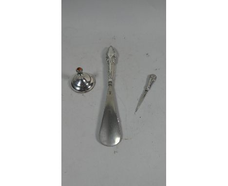 A Collection of Silver Items to Include Silver Paperweight with Jewelled Mount, Silver Handled Shoe Horn and Button Hooks (AF
