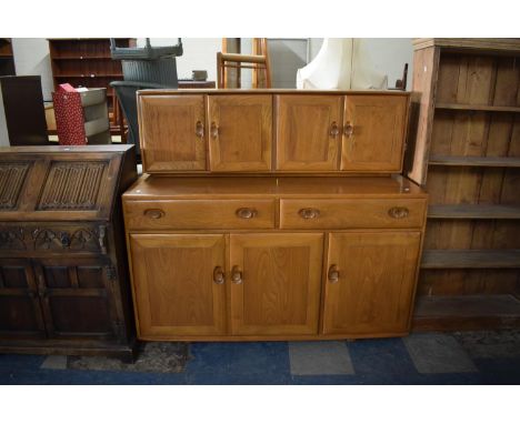An Ercol Sideboard with Two Long Drawers Over Three Cupboard Base, Raised Cupboard Top, 136cm Long 