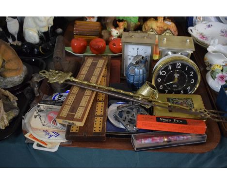 A Tray of Sundries to Include Novelty Grenade Table Lighter, Carriage and Alarm Clock, Cribbage Boards, Pens, Flatiron etc 