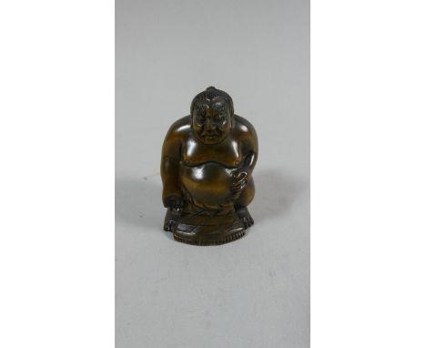 A Carved Wooden Netsuke in the Form of a Sumo Wrestler, Signed, 5cm High 