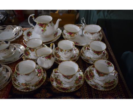 A Collection of Royal Albert Old Country Rose Teawares to Include Six Trios, Two Sugar Bowls, Cream Jug, Two Cake Plates and 
