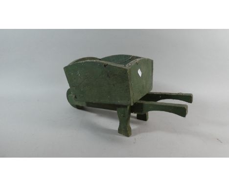 A Vintage Wooden Plant Stand in the Form of a Wheel Barrow, 45cm Long 