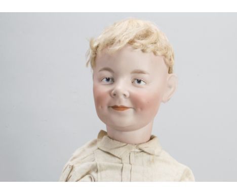 An extremely rare Armand Marseille character smiling boy with intaglio painted eyes size 7,   the bisque socket head depictin