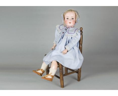 An Ernst Heubach 312 child doll,  with brown sleeping eyes, blonde mohair wig, jointed composition body, white ribbed cotton 