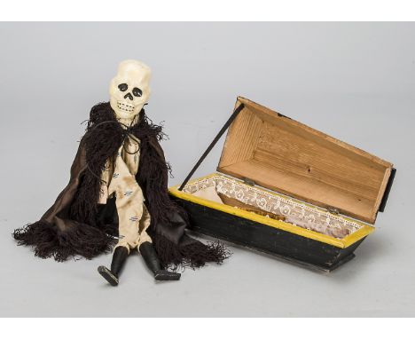 An unusual toy or model coffin, probably late 19th century with embossed paper decoration, painted black and yellow with hing