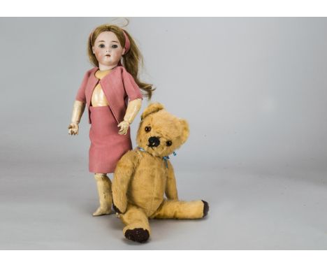 A Simon &amp; Halbig for Kammer &amp; Reinhardt child doll,  with blonde sleeping eyes, pierced ears, blonde hair wig and  jo