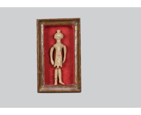 A small ancient Greek style terracotta doll or puppet, the torso and head in one piece with moulded elaborate hair or headdre