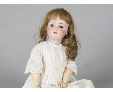 A Simon &amp; Halbig for CMB child doll,  with blue sleeping eyes, pierced ears, replaced light brown wig, jointed compositio