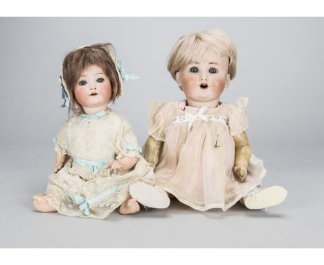 Two German character babies,  a Schutzmeister &amp; Quendt 201 with blue sleeping eyes, bent-limbed composition body and pink