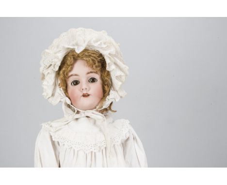 A large Simon &amp; Halbig for Heinrich Handwerck child doll,  with brown sleeping eyes, pierced ears, strawberry blonde moha