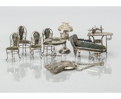 White metal filigree dolls’ house furniture, probably Chinese including chaise longue with blue velvet upholstery —3½in. (9cm