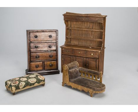 Large scale dolls’ house furniture, a late 19th century chest of drawers —9in. (22.5cm.) high (missing feet); a stained pine 