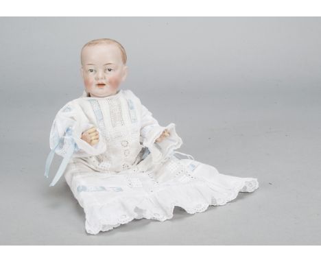 An Eisenmann &amp; Co character baby,  with blue intaglio eyes, open/closed mouth, blonde painted hair, bent-limbed compositi