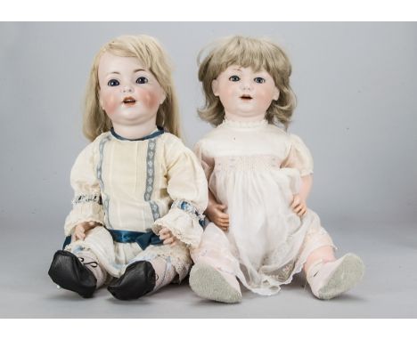Two German bisque headed character babies, an Armand Marseille for George Borgfeldt 327 with blue lashed sleeping eyes and be