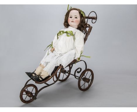 A Max Handwerck 286 Bebe Elite child doll,   with brown sleeping eyes, replaced brown wig, jointed composition body, white co