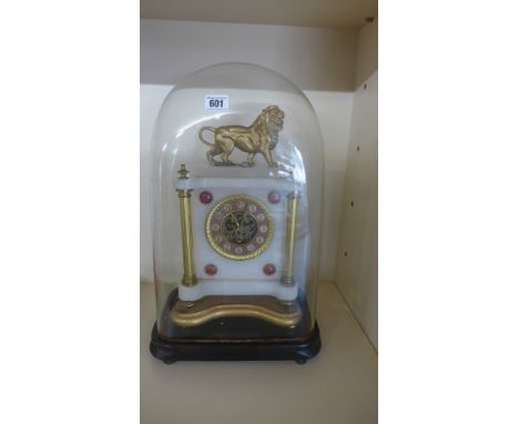 A 19th century French alabaster mantle clock under glass dome - the clock decorated with ormolu mounts and a decorated chapte