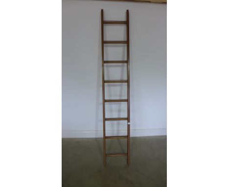 An eight rung ladder, waxed for decorative use - Height 207cm x 35cm 