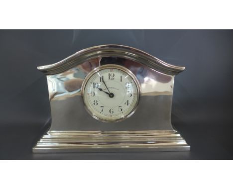 A silver plated mantle clock by Walker & Hall engraved to back - Presented to Mr Ronald Hernsby, by his fellow members of the
