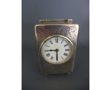 An ornate silver carriage clock by Percy Edwards Ltd. London 1907/08 - Height 11cm Condition report: Working with key overall