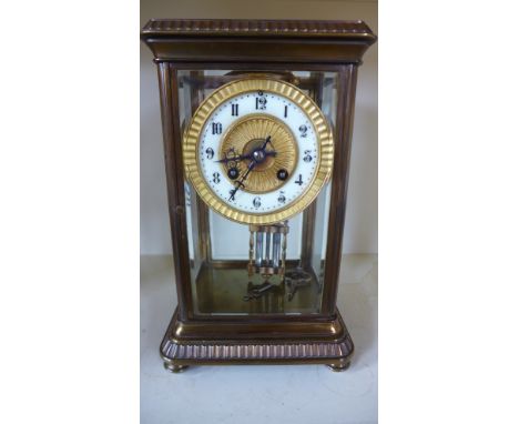 A brass four glass mantle clock with a Japy Freres striking movement - Height 28cm - spring missing to pendulum